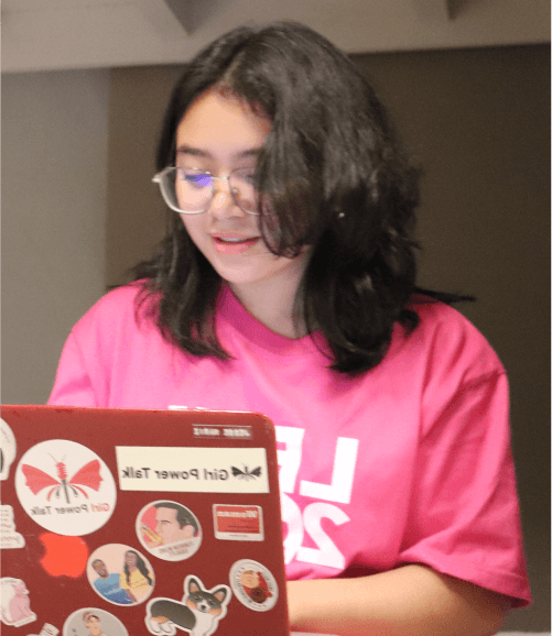 Women sitting and coding